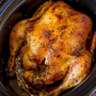 Slow Cooker Rotisserie Chicken made with just a few spices and in the slow cooker with CRISPY skin without a second spent in the oven!